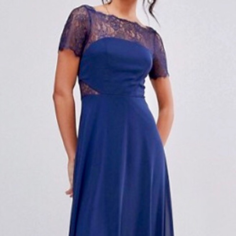 Navy blue dress with eyelash lace and boat neck.